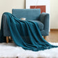 KNITTED MESH THROW TEAL